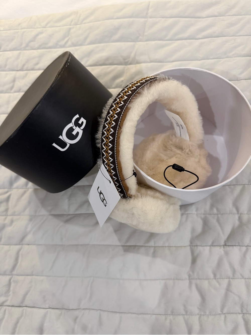 UGG Cream Shearling Earmuffs with Brown Decorative Trim